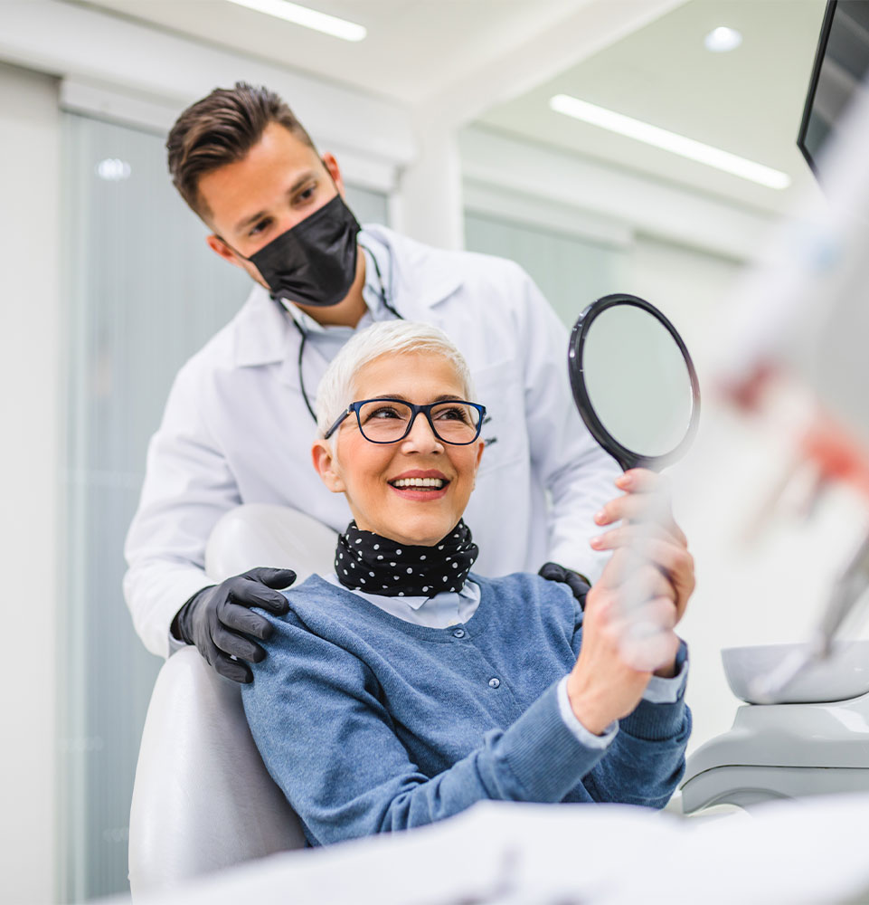 patient smiling brightly after their dental procedure