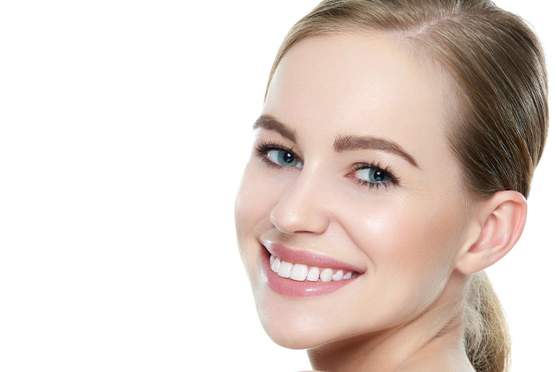 beautiful women smiling brightly for their photo shoot