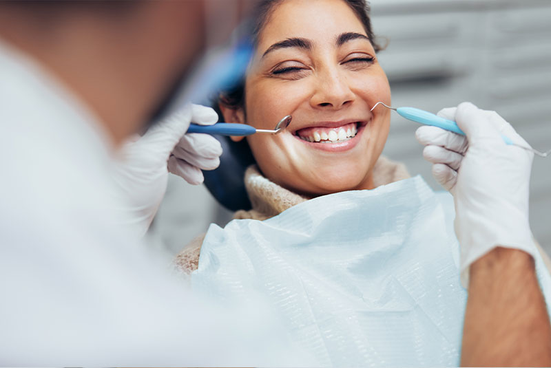 patient being seen by doctor for dental procedure