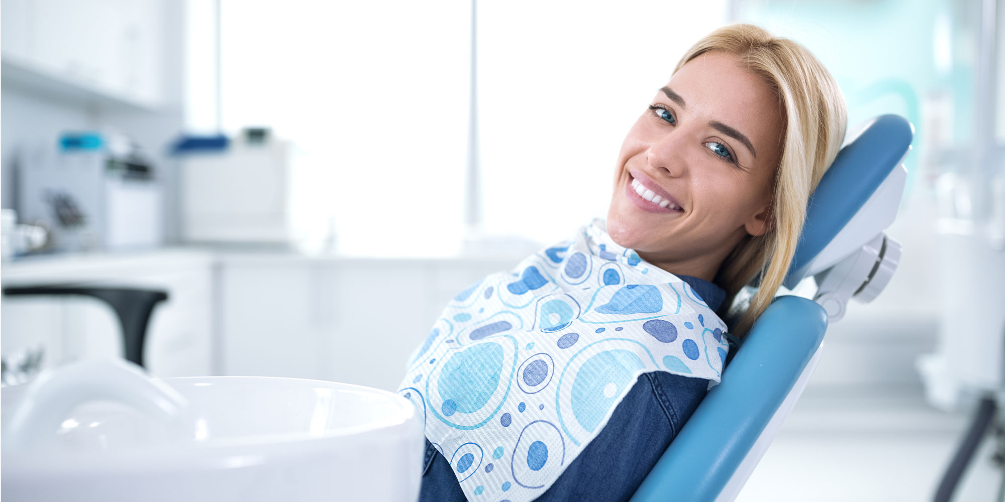 satisfied dental patient within the dental center